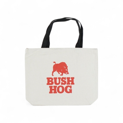 Bush Hog canvas tote bag with red logo and black handles.